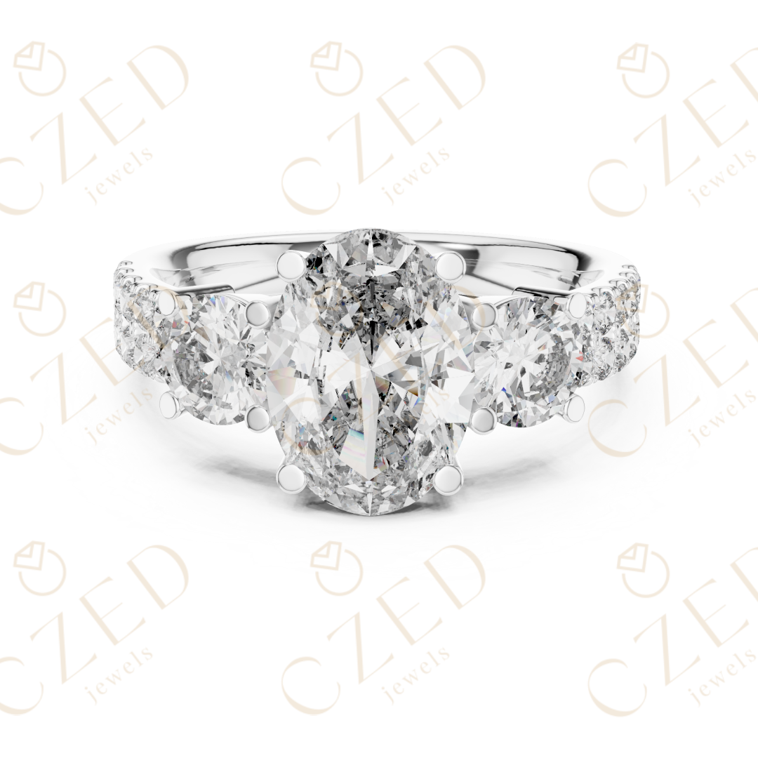 Oval Cut Diamond Three Stone Ring with Round Side Diamonds