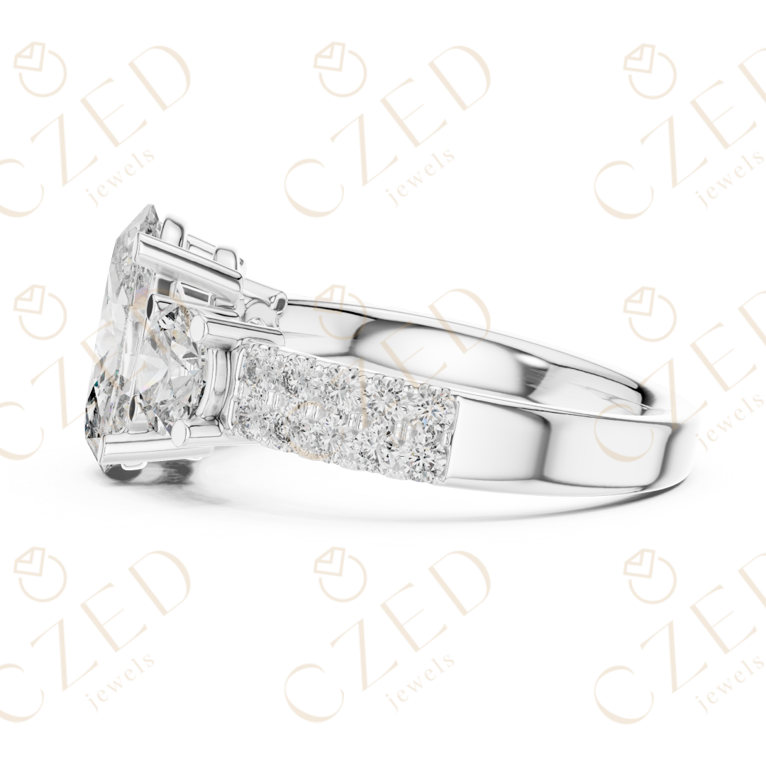 Oval Cut Diamond Three Stone Ring with Round Side Diamonds