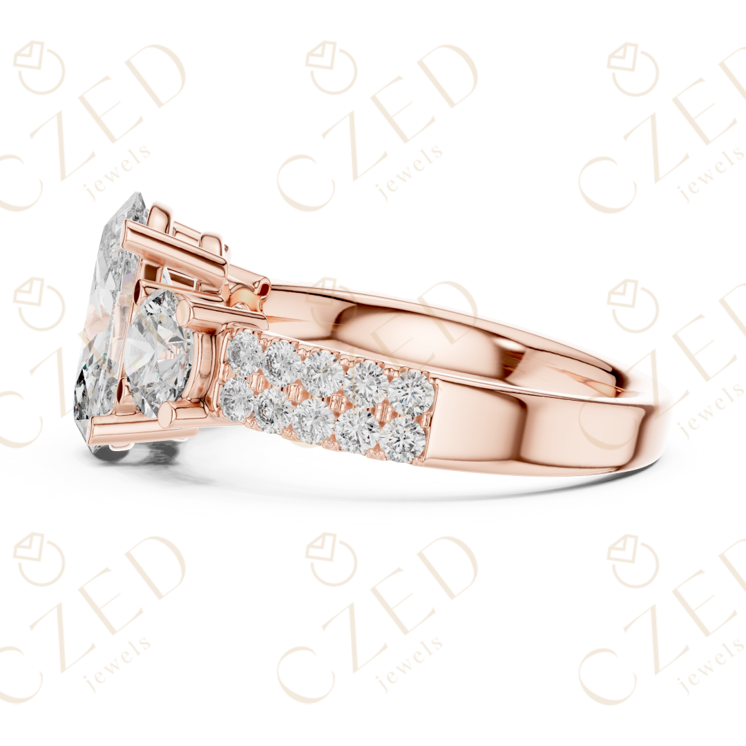 Oval Cut Diamond Three Stone Ring with Round Side Diamonds