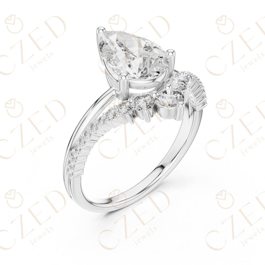 Pear Cut Diamond Engagement Ring with Round Side Stones