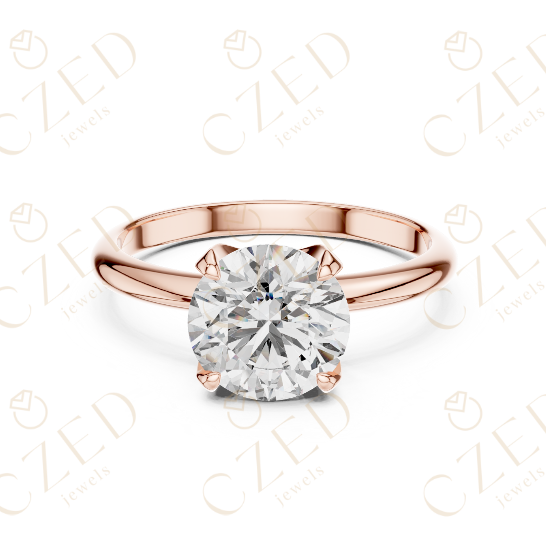 Classic round cut diamond solitaire ring with prong setting