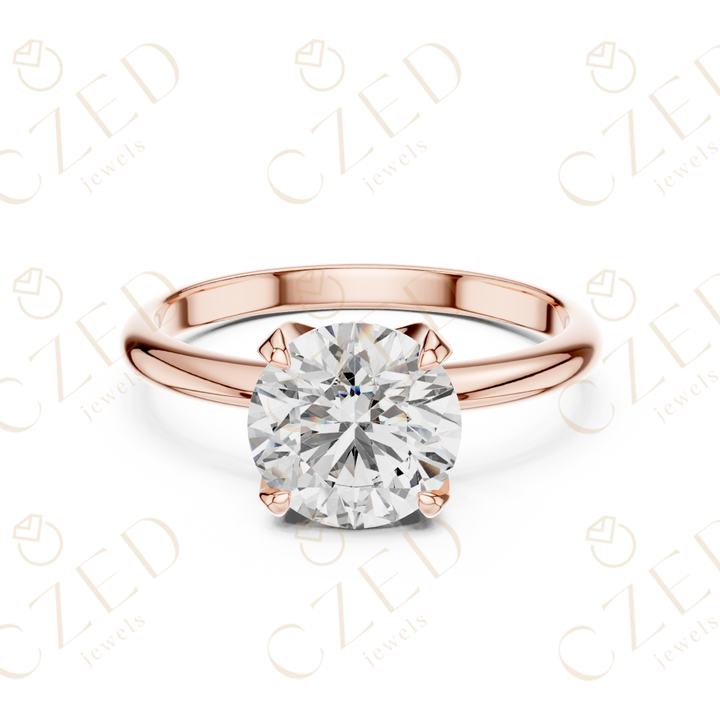 Classic round cut diamond solitaire ring with prong setting