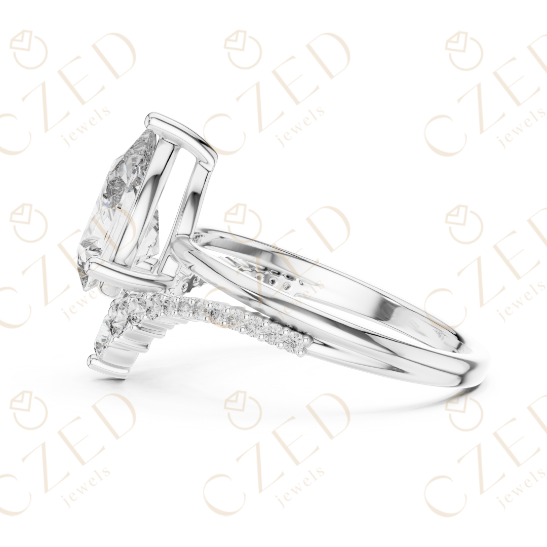 Pear Cut Diamond Engagement Ring with Round Side Stones