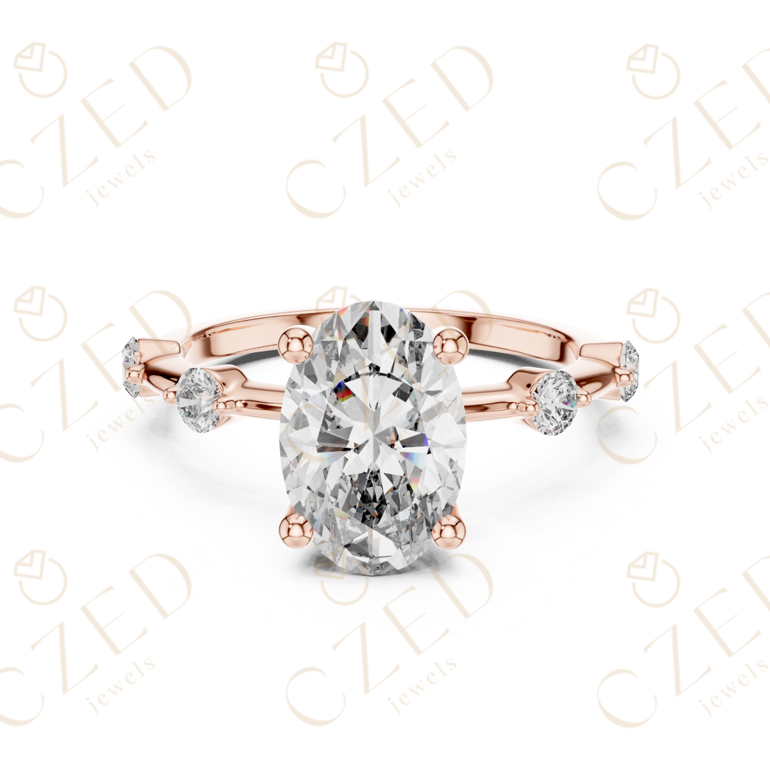 Oval Cut Diamond Ring with Round Side Stone Accents