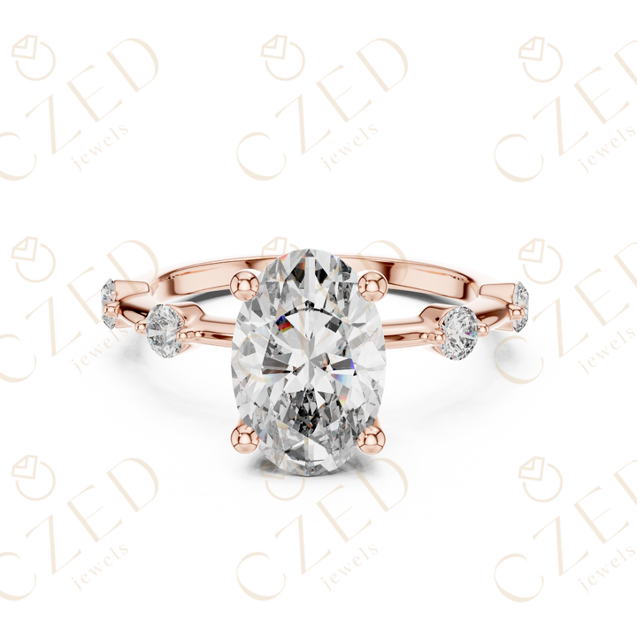 Oval Cut Diamond Ring with Round Side Stone Accents