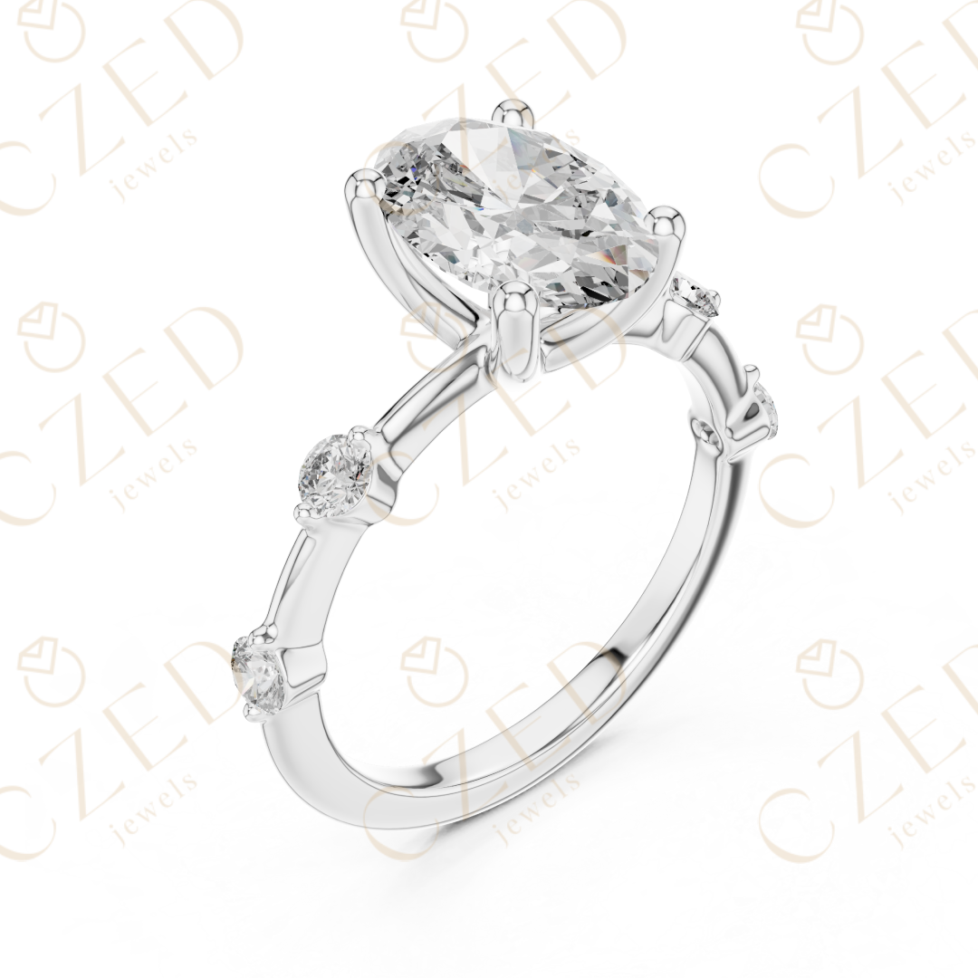 Oval Cut Diamond Ring with Round Side Stone Accents
