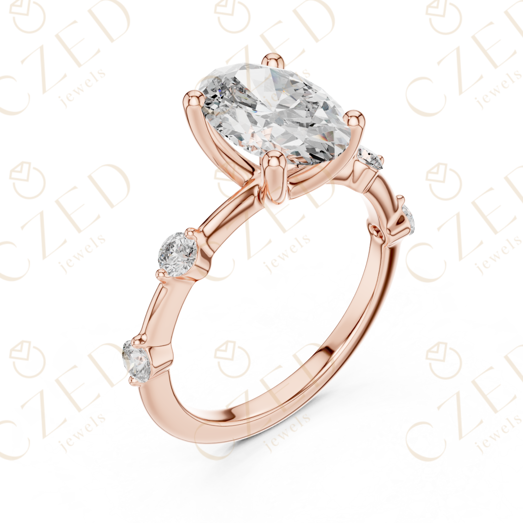 Oval Cut Diamond Ring with Round Side Stone Accents
