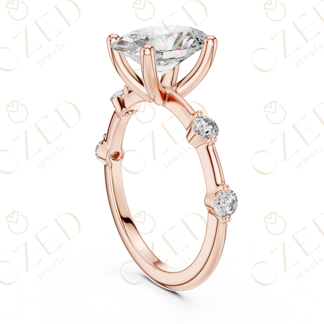 Oval Cut Diamond Ring with Round Side Stone Accents