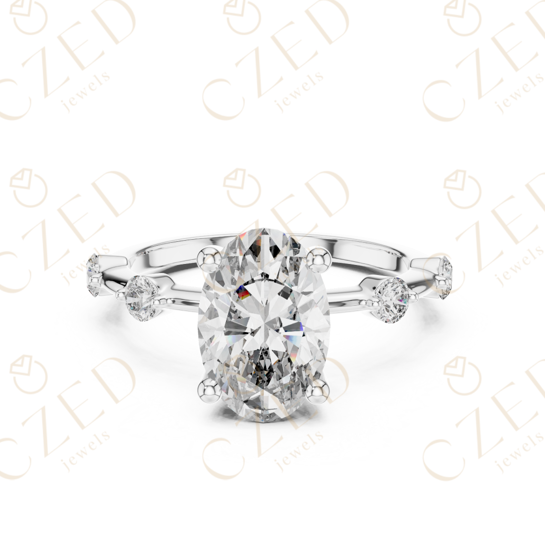 Oval Cut Diamond Ring with Round Side Stone Accents