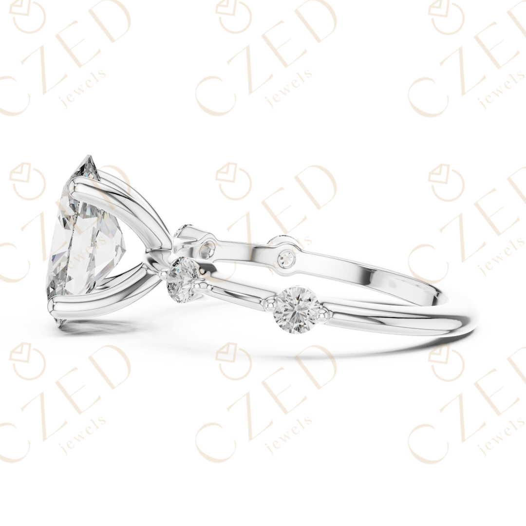 Oval Cut Diamond Ring with Round Side Stone Accents