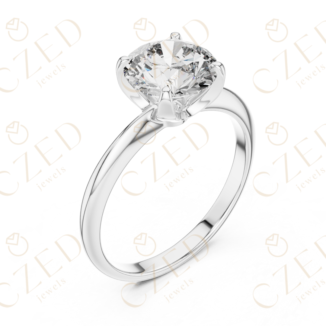 Classic Round Cut Solitaire Diamond Ring with Refined Four Prong Setting