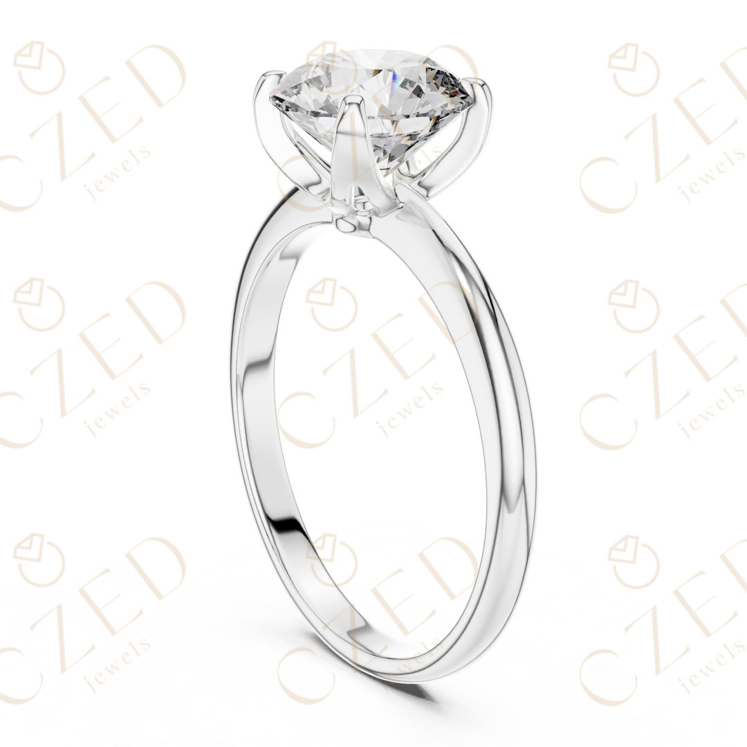 Classic Round Cut Solitaire Diamond Ring with Refined Four Prong Setting