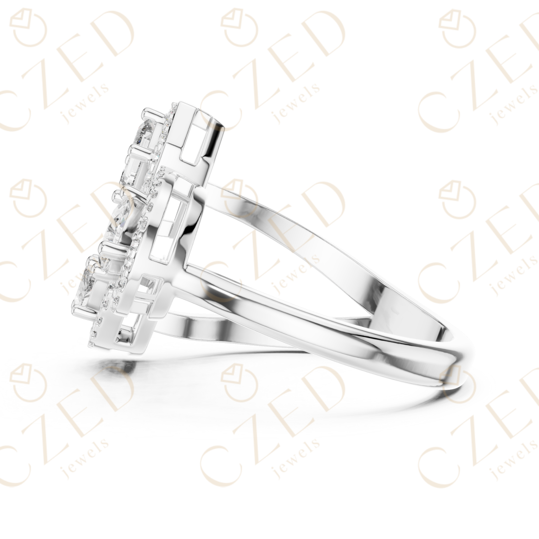 Emerald, Marquise and Pear Cut Diamond Three Stone Halo Ring