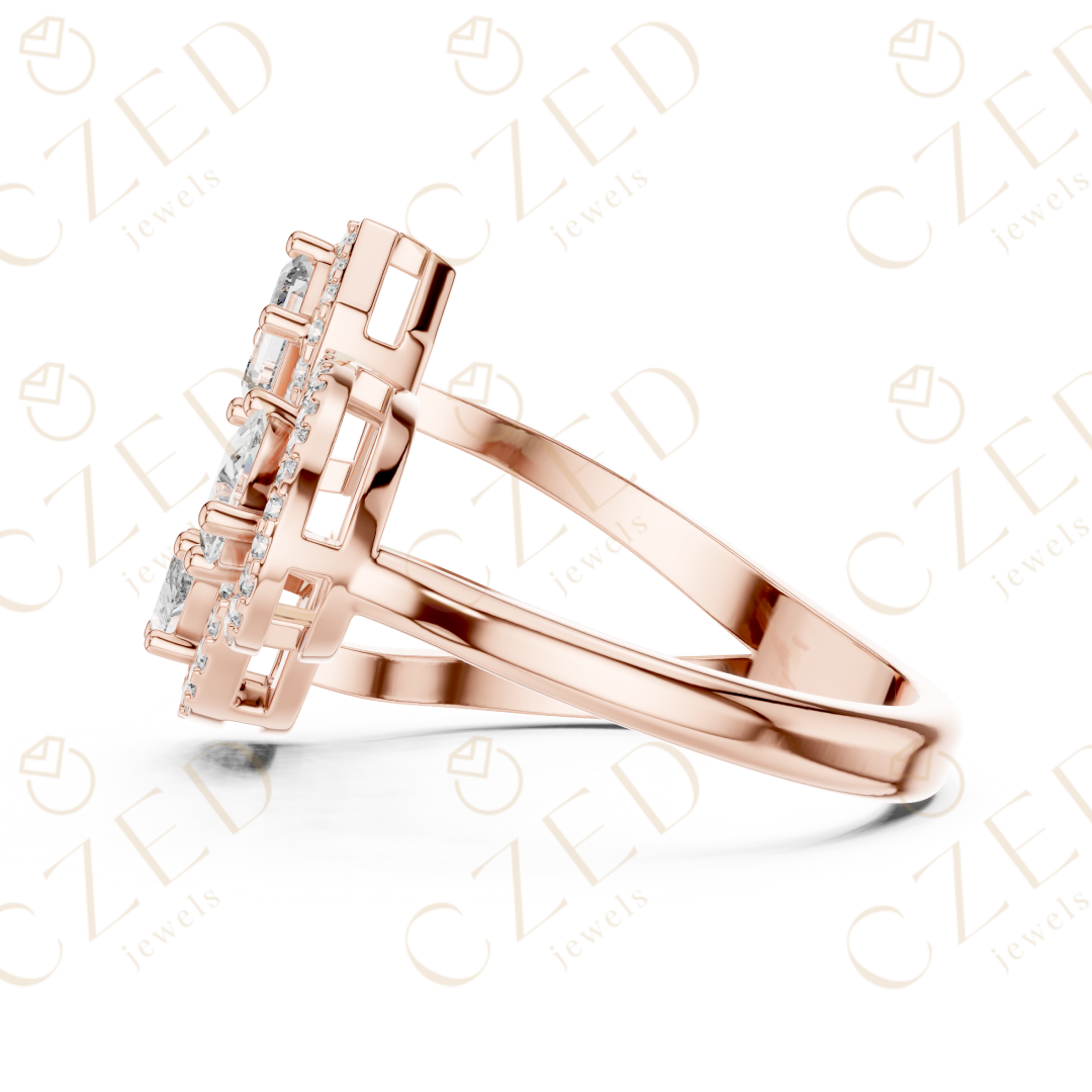 Emerald, Marquise and Pear Cut Diamond Three Stone Halo Ring