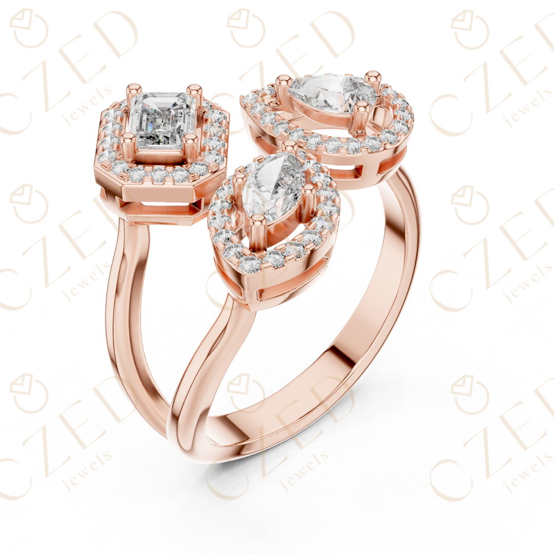 Emerald, Marquise and Pear Cut Diamond Three Stone Halo Ring