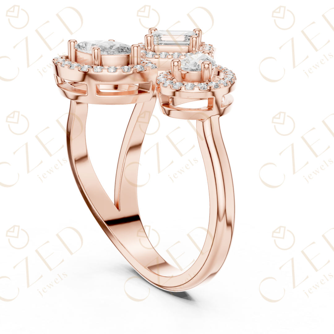 Emerald, Marquise and Pear Cut Diamond Three Stone Halo Ring